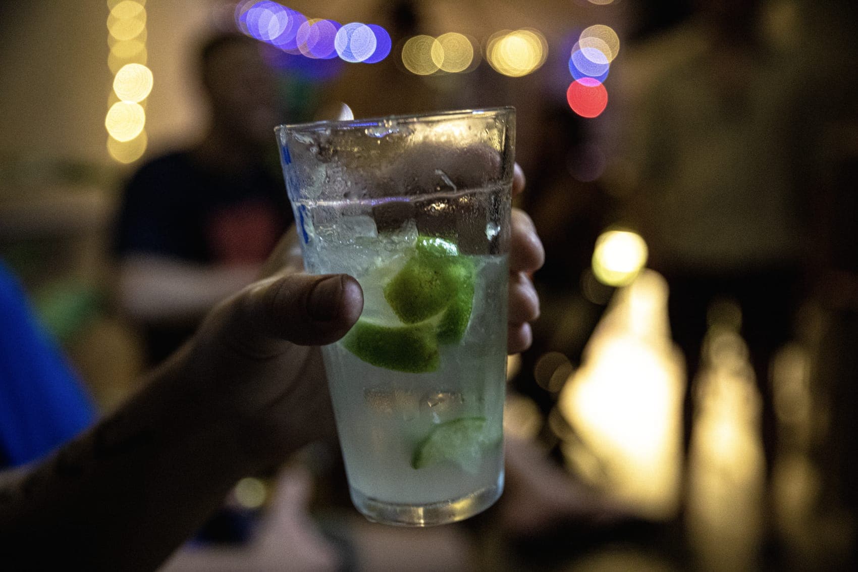 Guests socialising with drinks in the evening